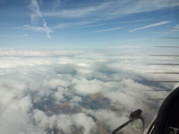 When flying VFR over the cloud tops, it is important to maintain situational awareness and keep track of gaps in the cover where you can descend safely if needed. From 11 500 feet, that task is much easier.